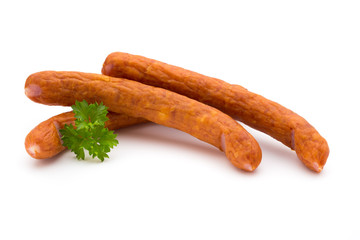 Stack of smoked sausages isolated on a white background.