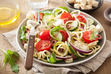spiralized courgette salad greek style with tomato feta olives cucumber