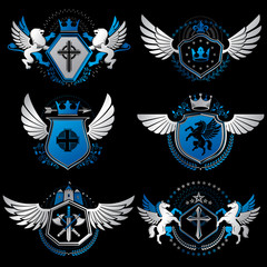 Vintage heraldry design templates, vector emblems created with bird wings, crowns, stars, armory and animal illustrations. Collection of vintage style symbols.