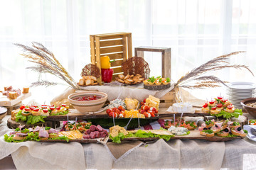 Banquet Table in restaurant served with different meals.