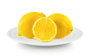 lemon in white plate on white background