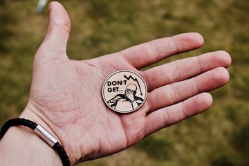 Bitcoin coin in hand