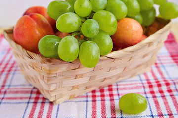 white grapes in a straw basket