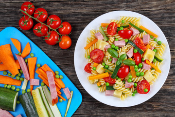 italian pasta with vegetables on plate