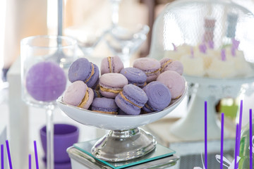 Fototapeta na wymiar Wedding macaroni purple on a plate