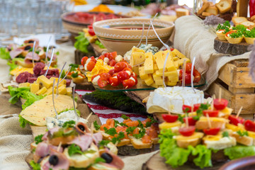Banquet Table in restaurant served with different meals.