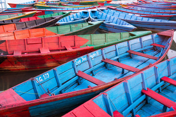 Fototapeta na wymiar Colorful wooden boat on Phewa lake , Pokhara, Nepal