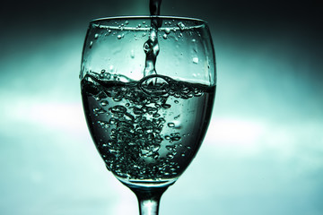 Wine is poured into a glass