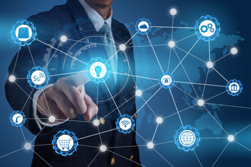 Business man working with modern virtual technology and pressing a button on the touch screen. futuristic technology concept.