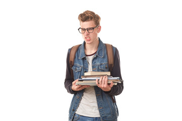 Portrait of college nerd in eyeglasses with stack of books