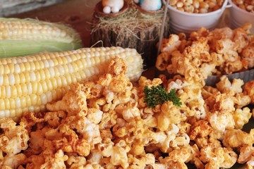 Popcorn with butter and fresh corn cob