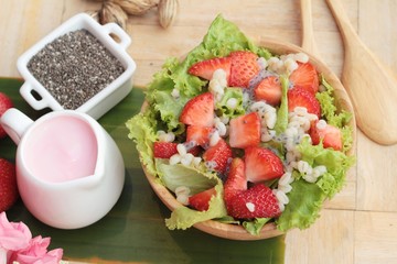 Strawberry salad ingredients, lettuce, chia seeds, barley