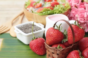 Strawberry salad ingredients, lettuce, chia seeds, barley