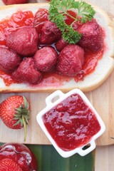 Strawberry jam with slice of bread delicious