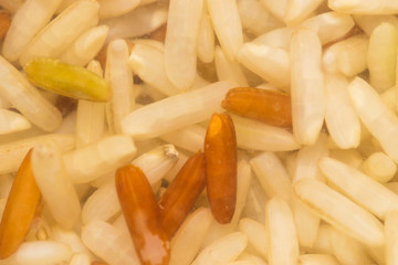 Close up of Brown rice and red rice in water