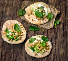 Flatbread with chickpea and avocado.