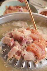 Pork grill on hot coals , Korean BBQ style.