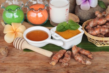 Turmeric powder with honey ,milk, salt for scrub