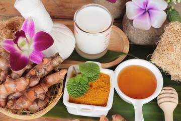Turmeric powder with honey ,milk, salt for scrub