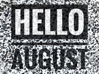 Hello August words on black and white marble table background.