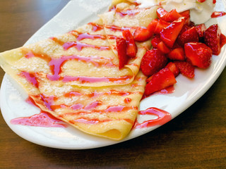 Homemade french Strawberry crepe on the table