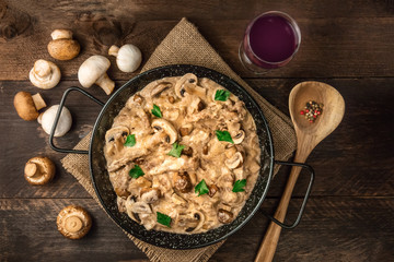 Mushroom beef stroganoff with wine and copy space