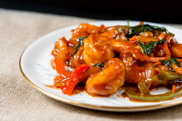wok fried chicken stir fry with sweet peppers and chinese vegetables