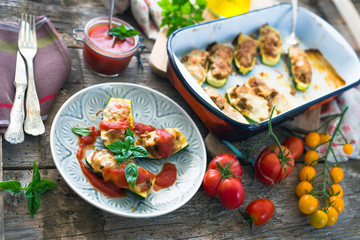 Zucchini stuffed with minced and mozzarella