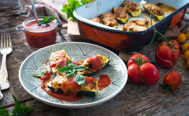 Zucchini stuffed with minced and mozzarella