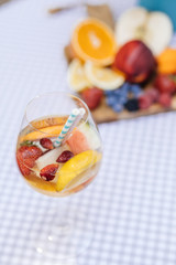 Delicious Red Sangria with fruits on table