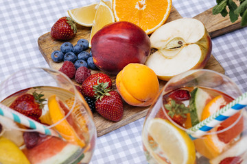 Delicious Red Sangria with fruits on table