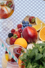 Delicious Red Sangria with fruits on table