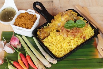 chicken biryani with rice delicious and sauce