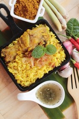 chicken biryani with rice delicious and sauce