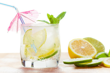 Cocktail mojito on a white background on a wooden table