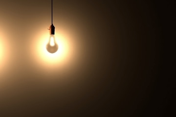 Light bulb glowing in the dark with place for text. 3d rendered