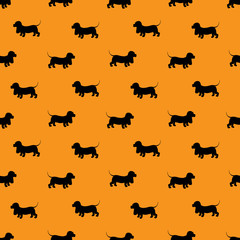 Seamless pattern with black dogs silhouettes - Dachshund on oran