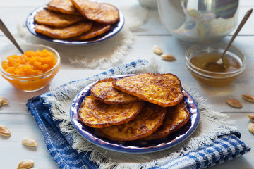Pumpkin pancakes with honey and tea