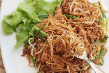 Fried noodle Thai style with pork is delicious