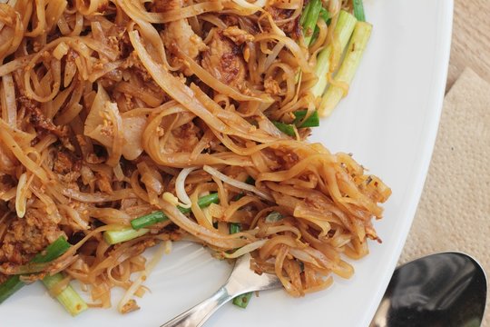 Fried noodle Thai style with pork is delicious