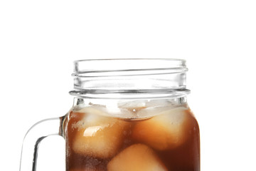 Mason jar with cold brew coffee and ice on white background