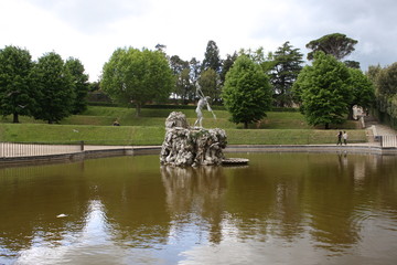 Fototapeta na wymiar Neptune fountain in the center of the Boboli Gardens. The Sculptor, Stoldo Lorenzi. Florence