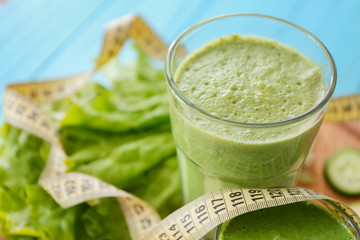 Glass with fresh tasty vegetable smoothie, closeup
