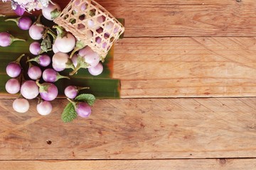 Fresh eggplant purple organic on wood background