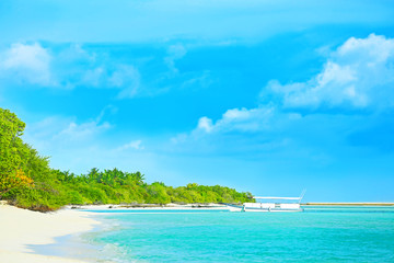 View of boat and sea beach at tropical resort