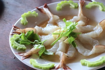 Shrimp in fish sauce on white dish decorate with vegetable Thai fresh food 