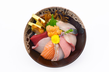 Japanese food raw fish mixed sashimi (maguro, otoro, salmon, sea bass, hamachi, uni) on white...