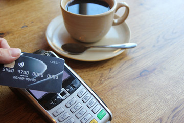 tap pay card chip pin coronavirus covid-19 ban concept contactless payment card pdq coffee cafe chip background copy space with hand holding credit card to pay  stock, photo, photograph