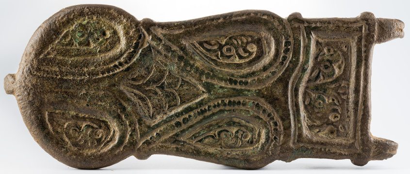 Ancient buckle visigoth or medieval of bronze with floral decoration.