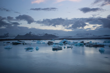 Iceland - Majestic landscape with turquoise ice floes in glacier lagoon